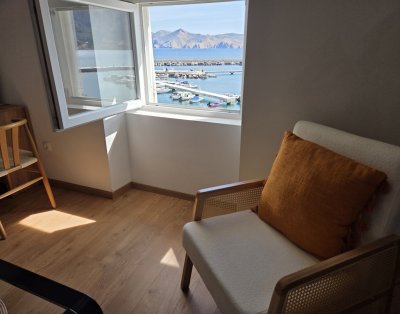 Portside – One-Bedroom Attic Apartment with Sea View on the Promenade in Baška